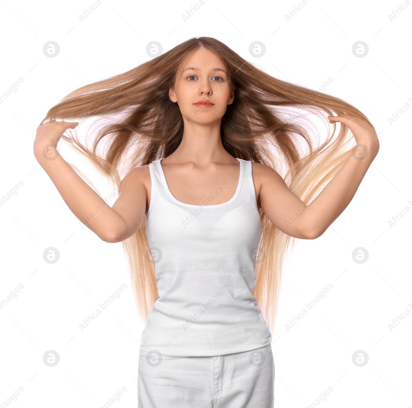 Photo of Teenage girl with strong healthy hair on white background