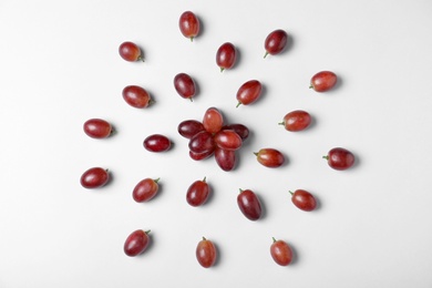 Fresh ripe juicy grapes on white background, top view