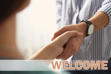 Image of Welcome to team. Employee shaking hands with intern in office, closeup