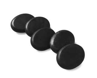 Group of black stones on white background