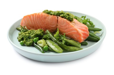 Photo of Tasty cooked salmon with pesto sauce and fresh salad on white background