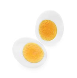 Photo of Halves of fresh hard boiled egg on white background, top view