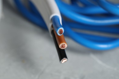 Colorful electrical wire on blurred background, closeup