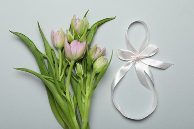 8 March card design with tulips on light grey background, flat lay. International Women's Day