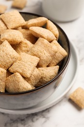 Delicious corn pads served on white marble table, closeup