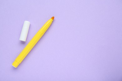 Photo of Yellow marker on light background, flat lay. Space for text