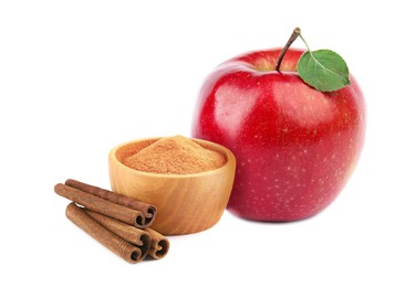 Image of Aromatic cinnamon sticks, powder and red apple isolated on white