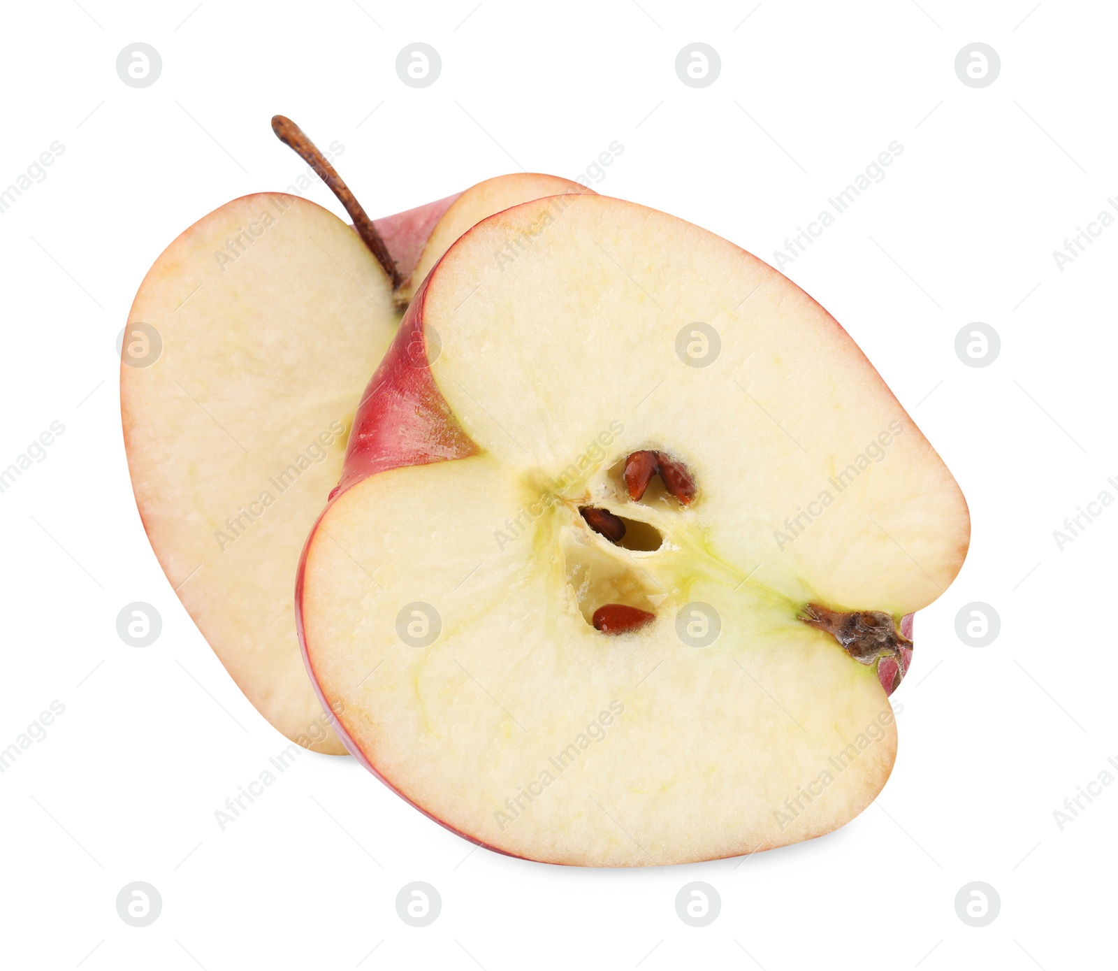 Photo of Halves of ripe red apple on white background