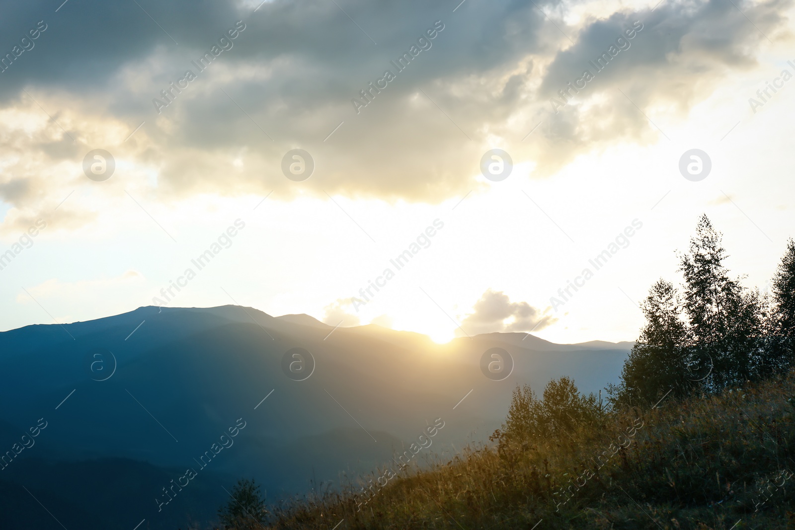 Photo of Picturesque view of beautiful mountains at sunset