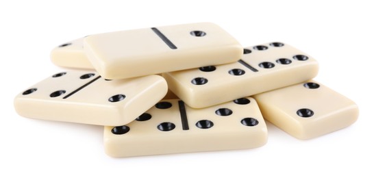 Pile of classic domino tiles on white background