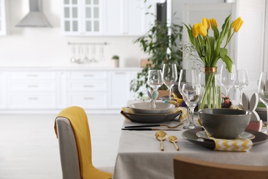 Beautiful Easter table setting with festive decor indoors