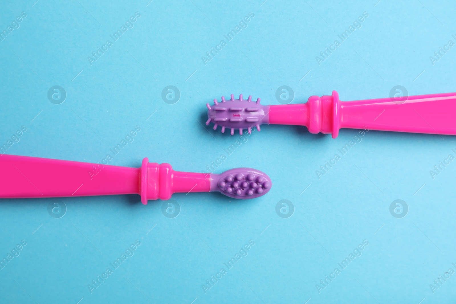 Photo of Manual toothbrushes for children on color background, top view