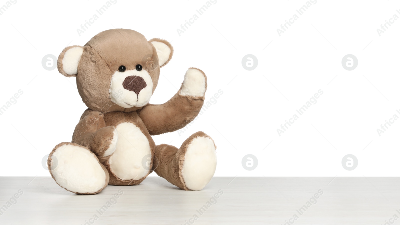 Photo of Cute teddy bear isolated on white. Child`s toy