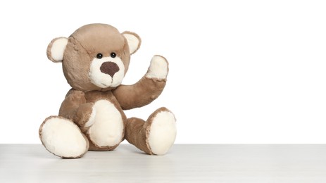 Photo of Cute teddy bear isolated on white. Child`s toy