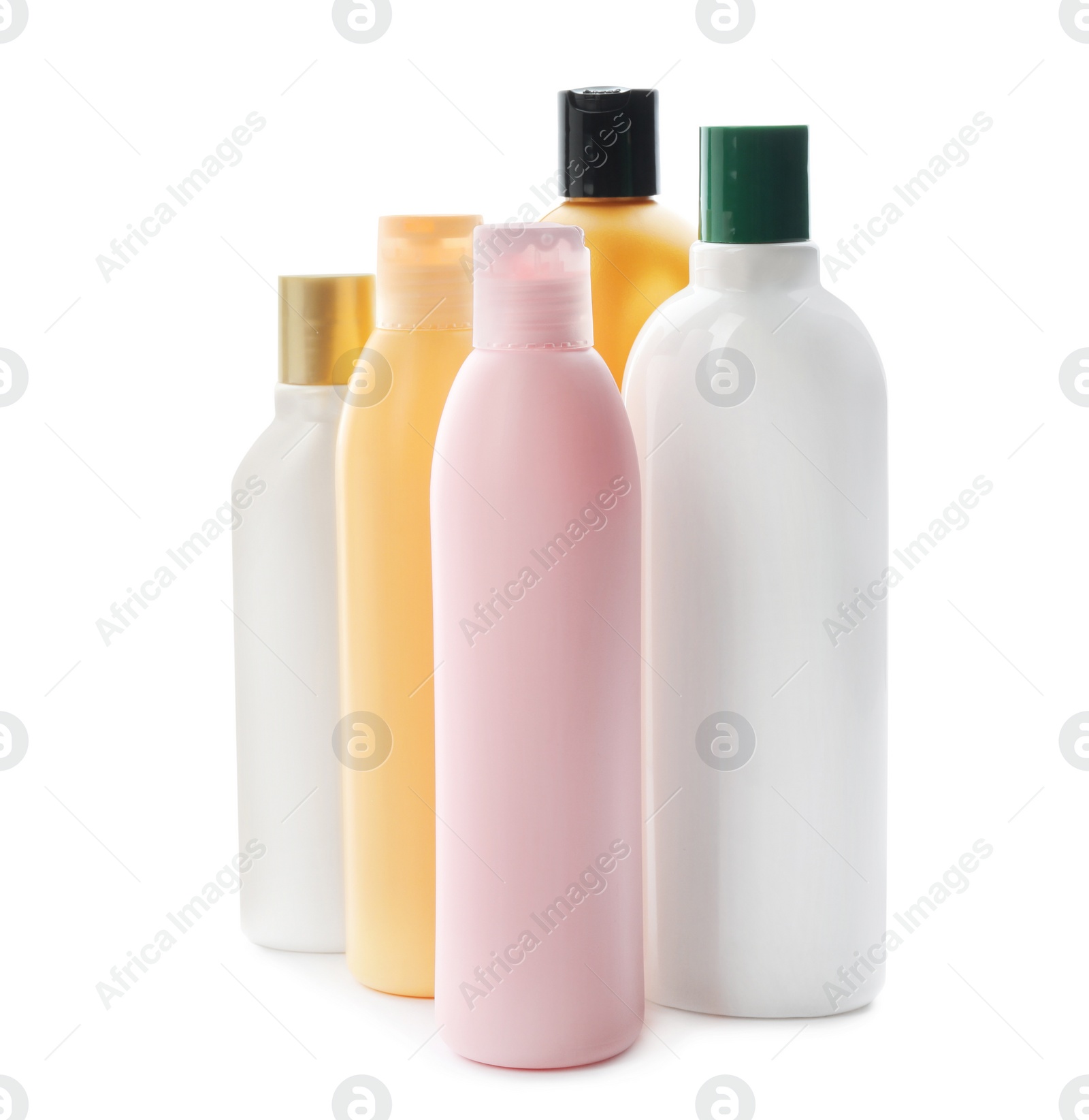 Photo of Bottles with cosmetic products on white background. Mockup for design