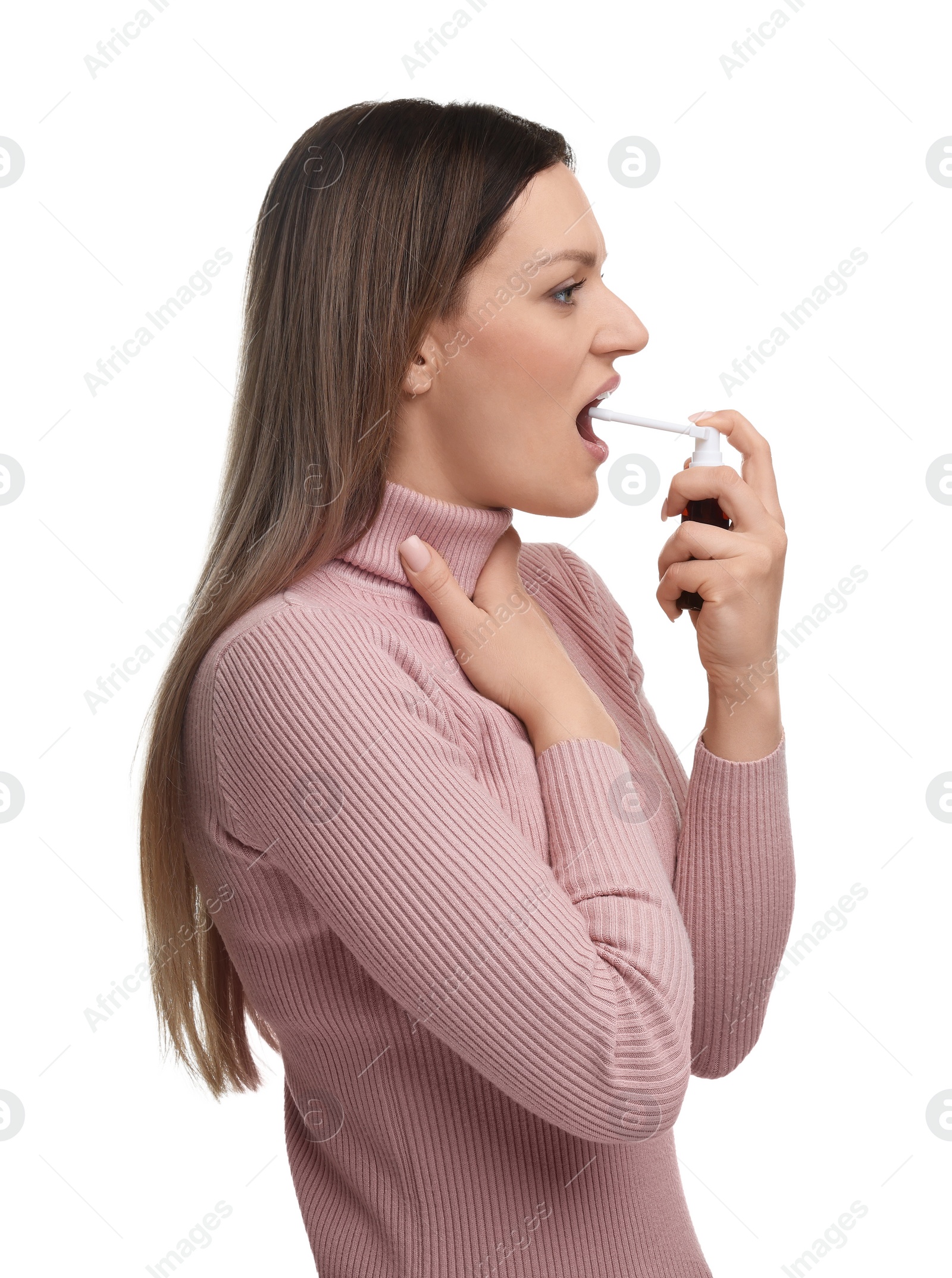 Photo of Woman using throat spray on white background