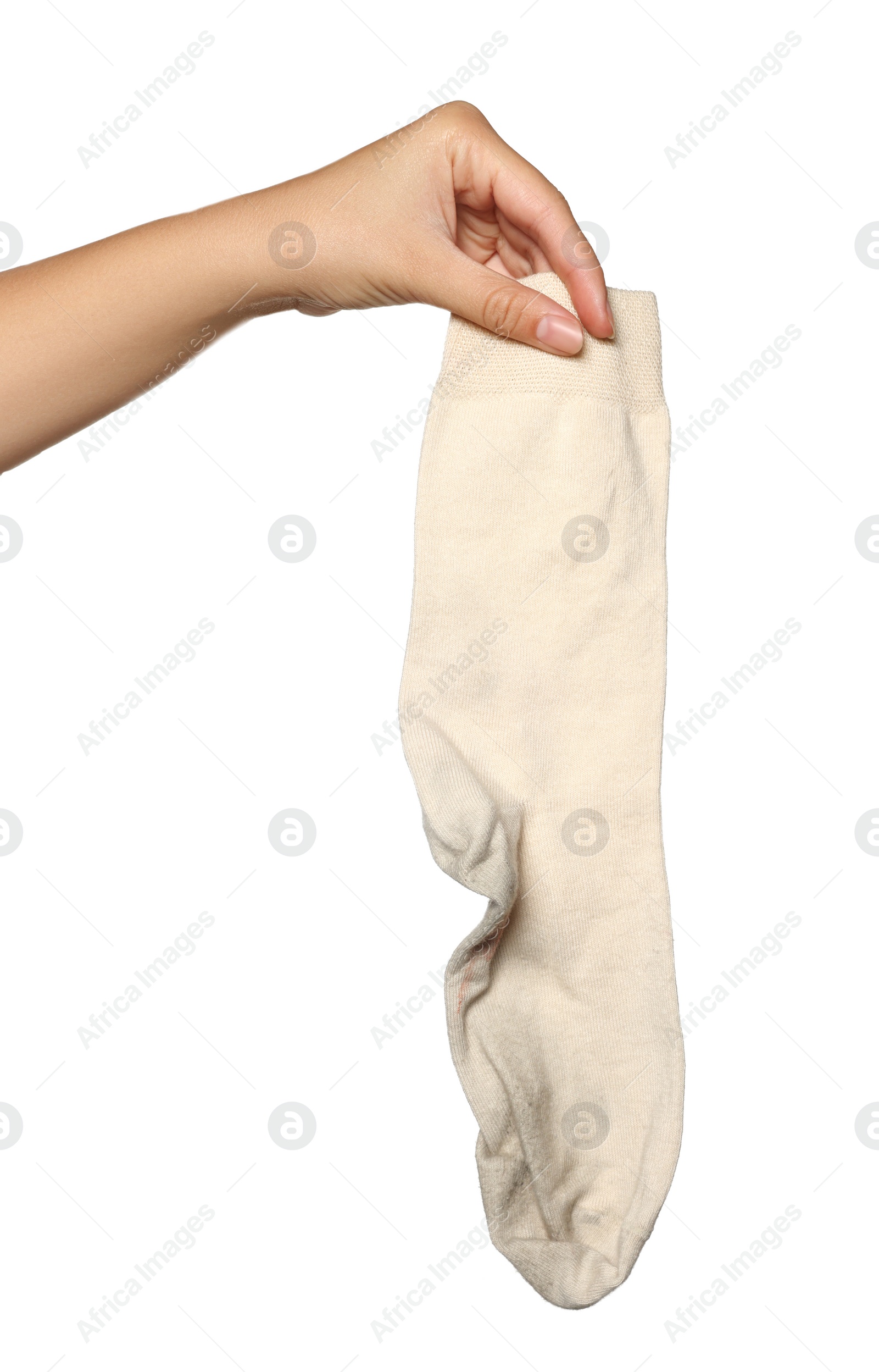 Photo of Woman holding dirty socks on white background, closeup