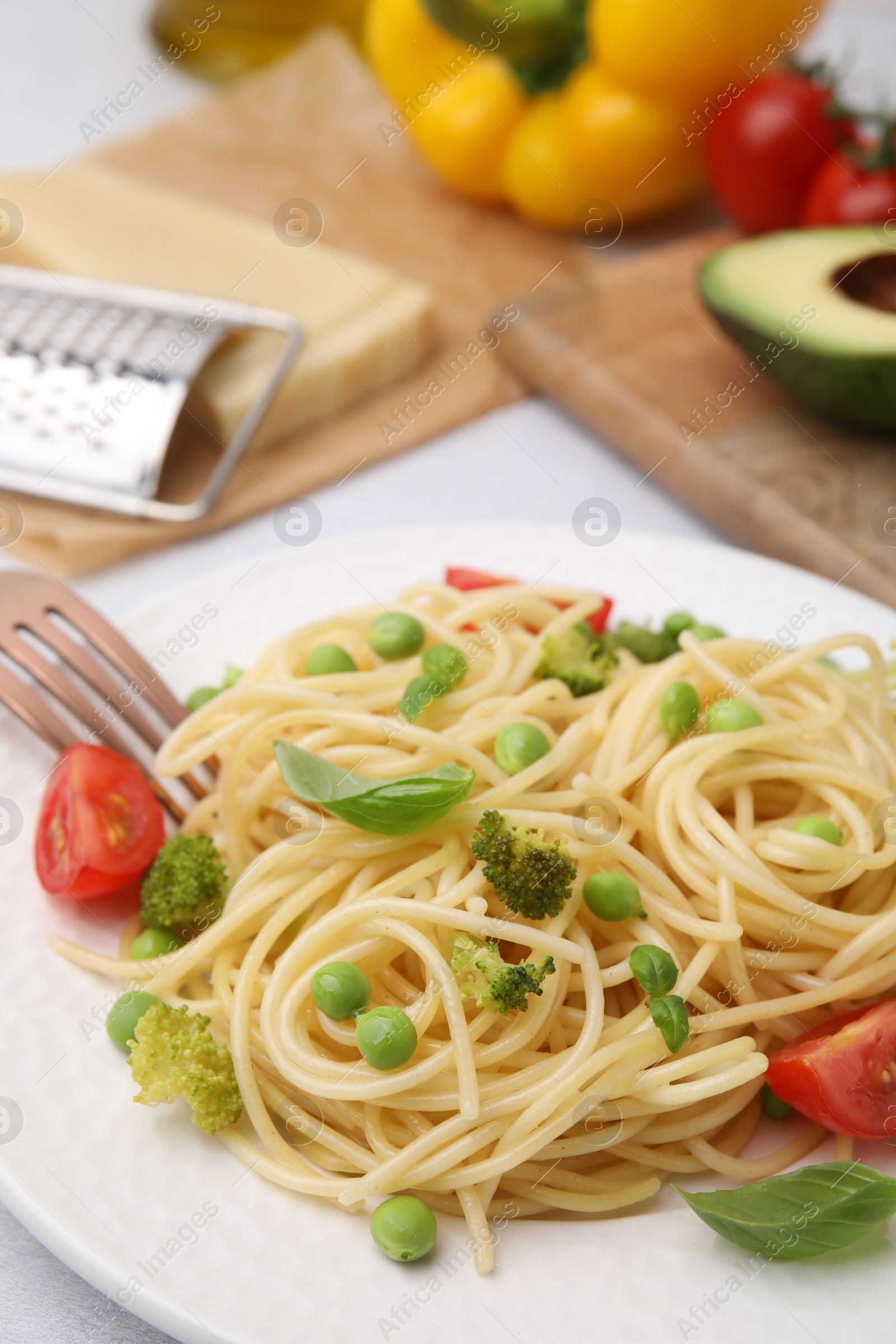 Photo of Plate of delicious pasta primavera, closeup view