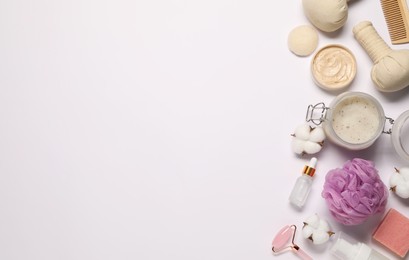 Bath accessories. Flat lay composition with personal care products on white background, space for text