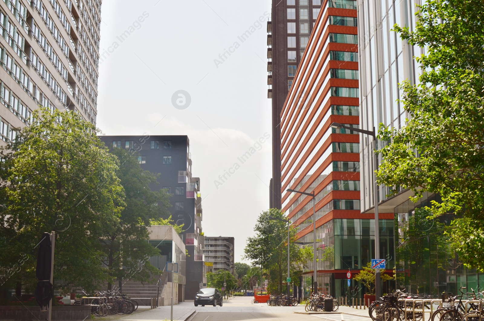 Photo of City street with beautiful modern urban architecture