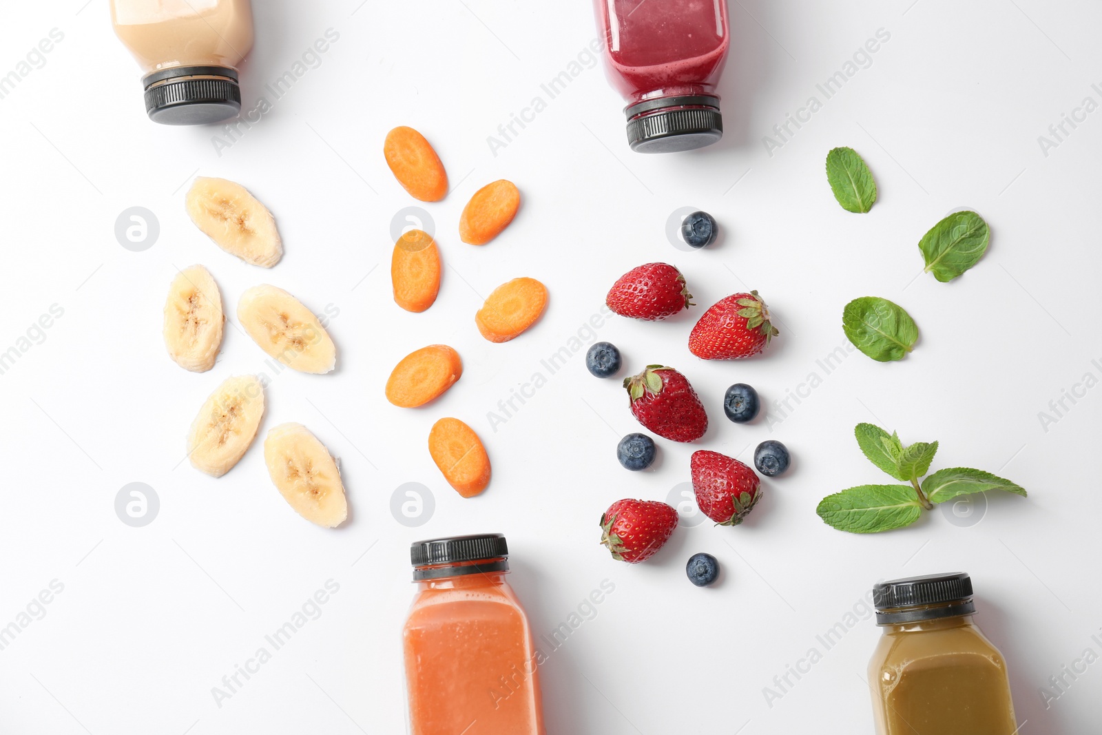 Photo of Flat lay composition with healthy detox smoothies and ingredients on light background