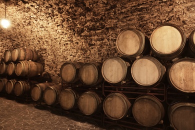 Photo of Wine cellar interior with large wooden barrels