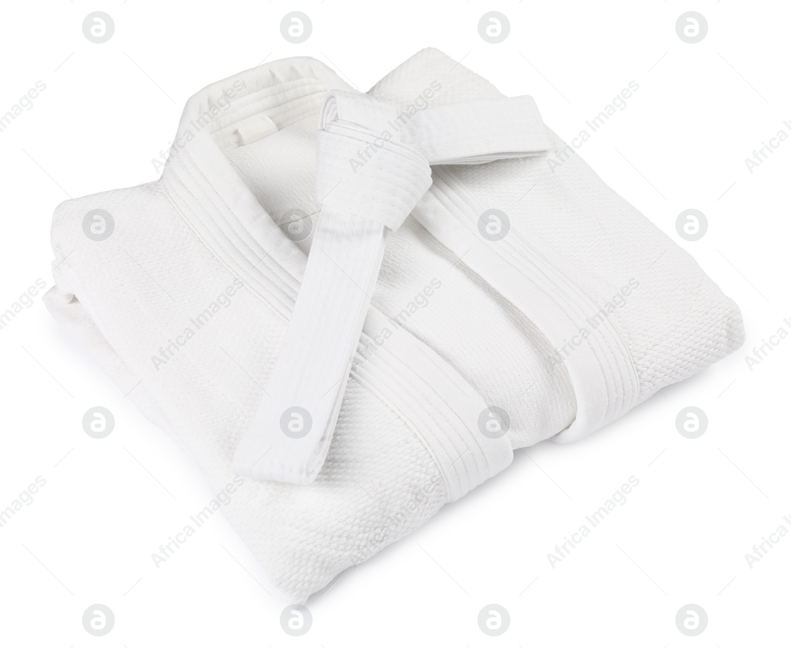 Photo of Karate belt and kimono isolated on white