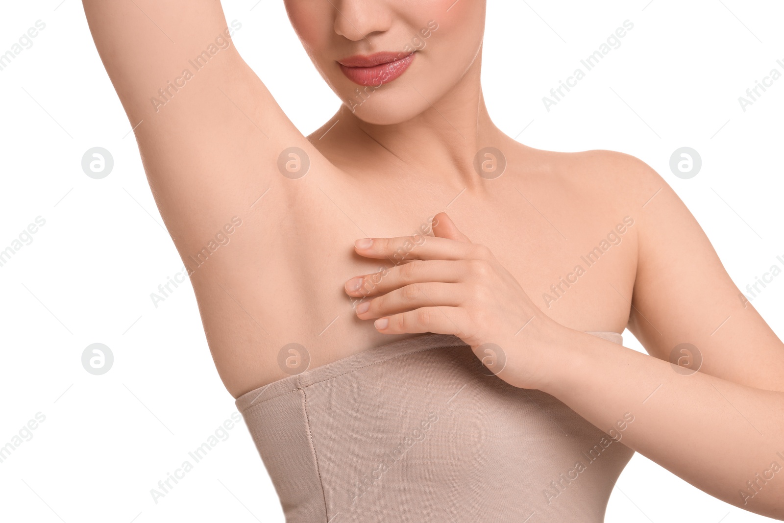 Photo of Beautiful woman showing armpit with smooth clean skin on white background