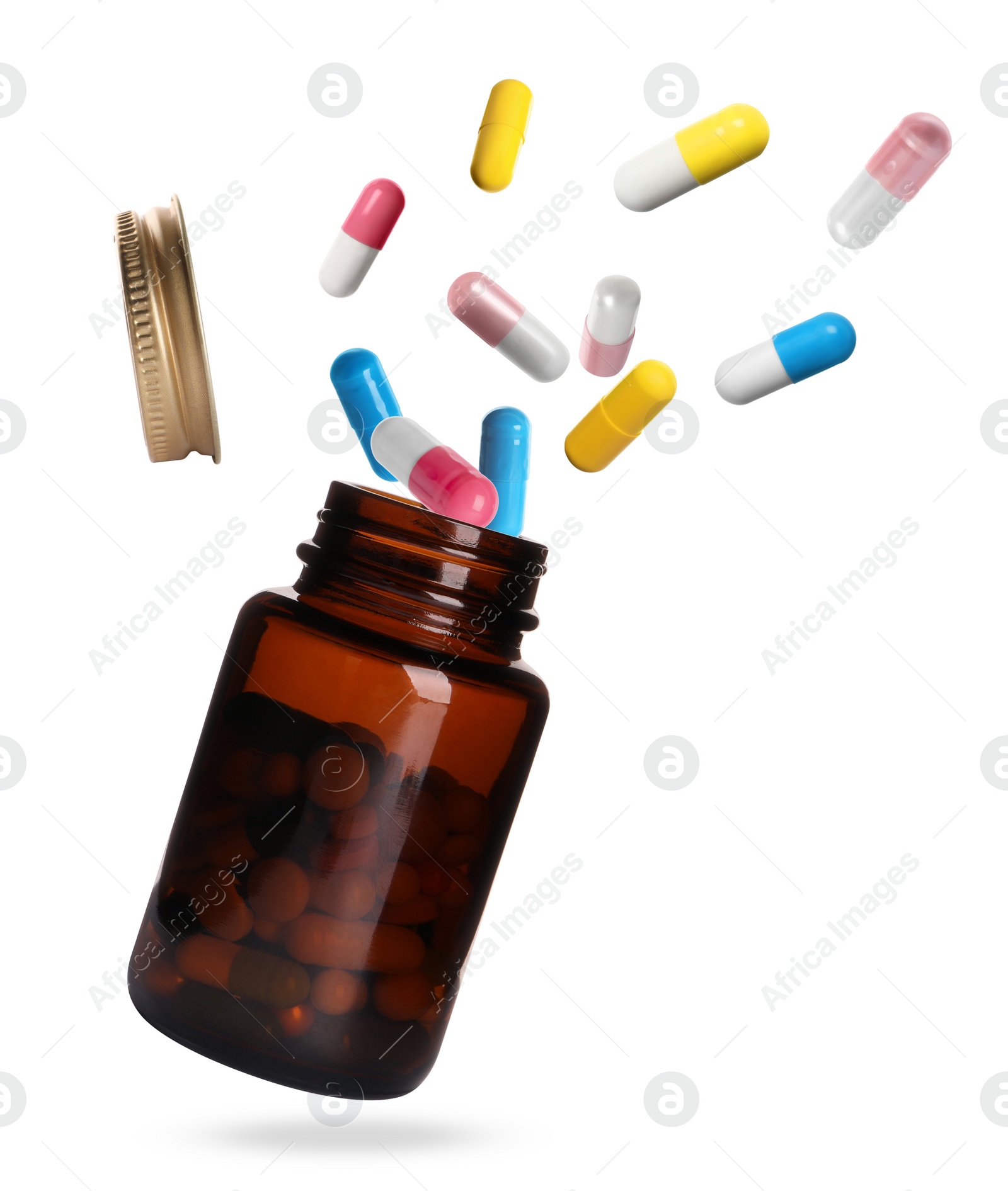 Image of Many different colorful pills falling into bottle on white background