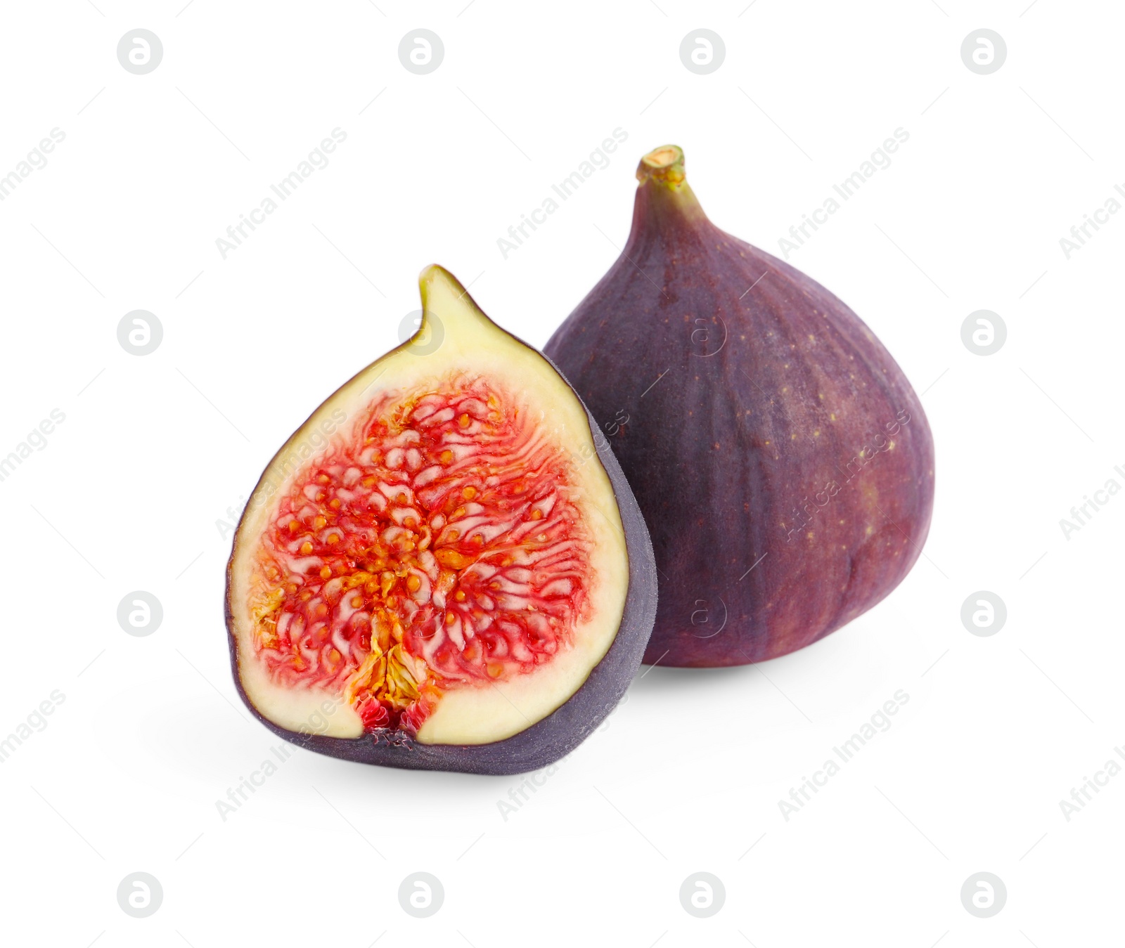 Photo of Cut and whole ripe figs isolated on white