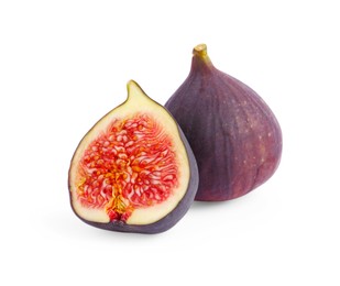 Cut and whole ripe figs isolated on white