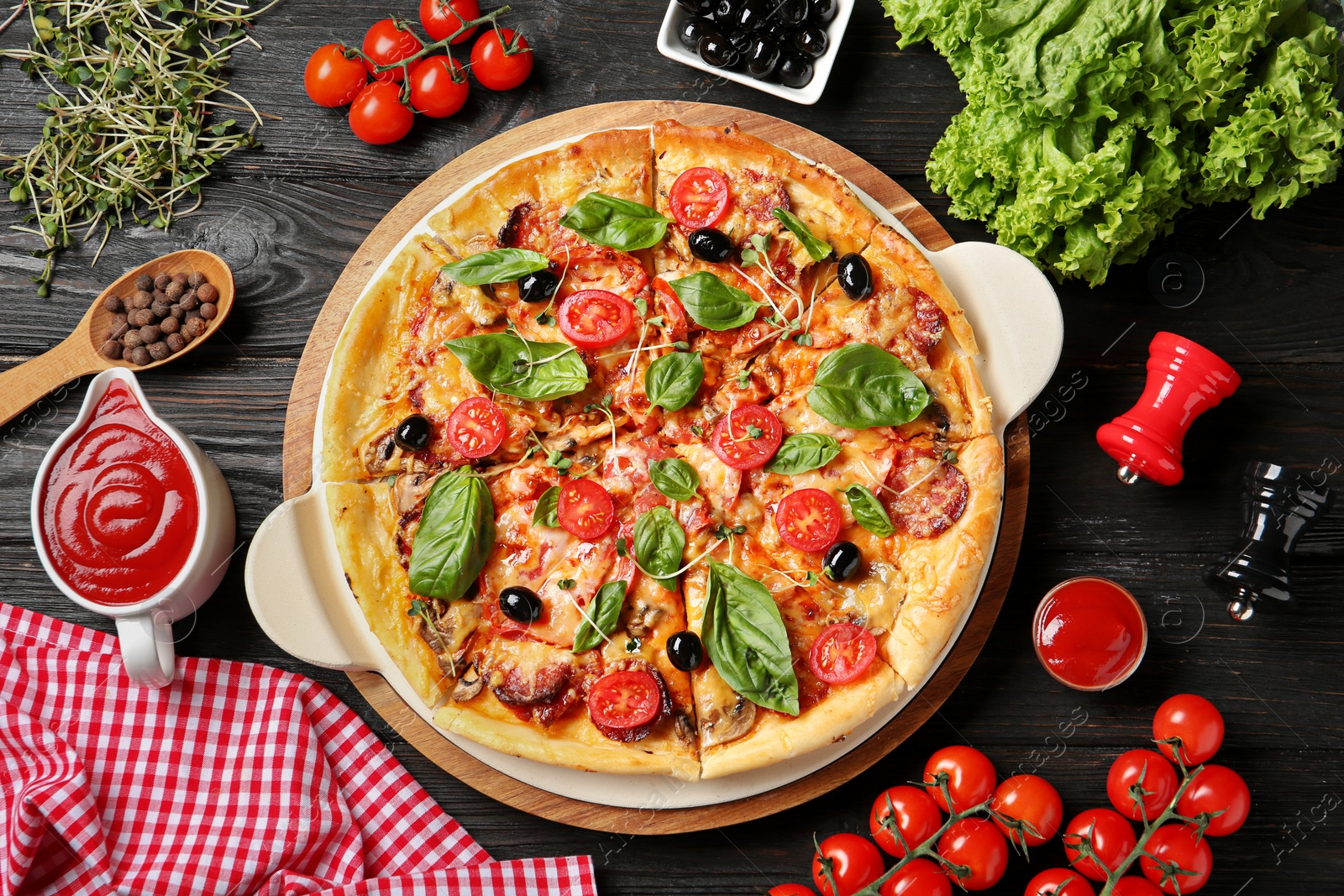 Photo of Flat lay composition with tasty homemade pizza on table