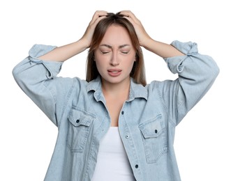 Young woman suffering from headache on white background