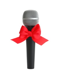 Microphone with bow on white background. Christmas music concept