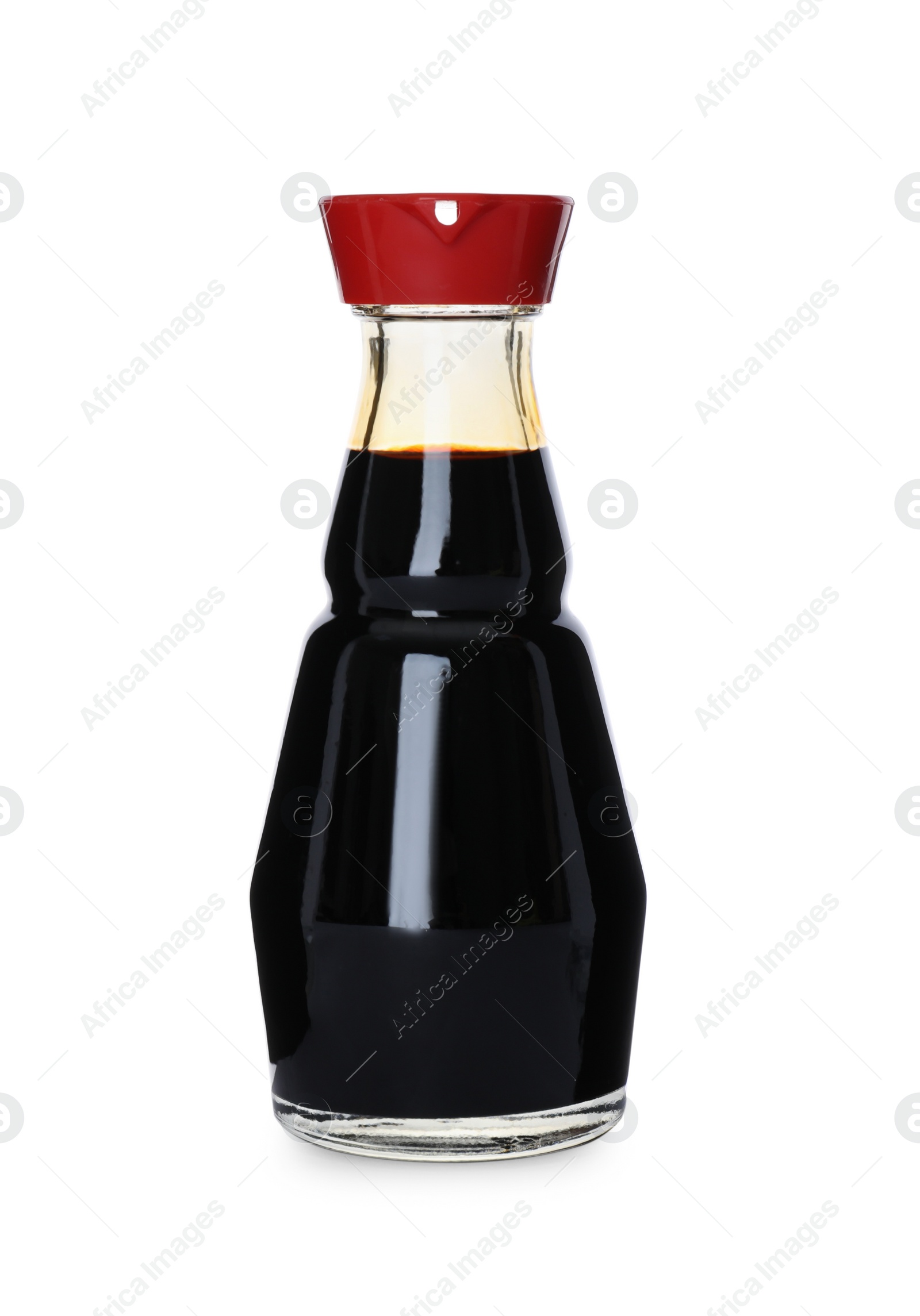 Photo of Bottle of tasty soy sauce isolated on white