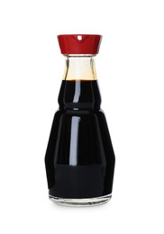 Photo of Bottle of tasty soy sauce isolated on white