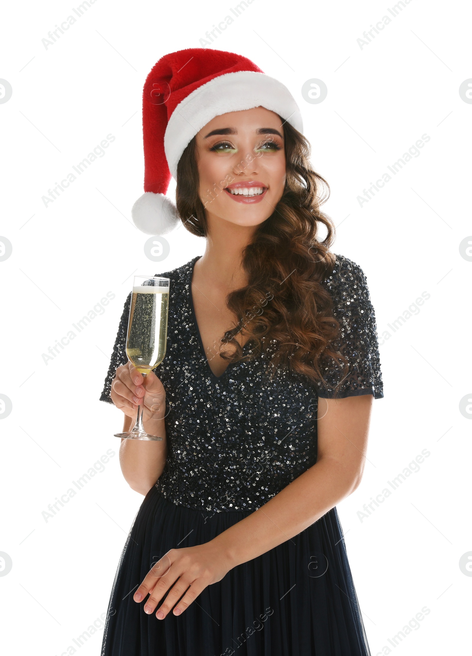 Photo of Beautiful woman in Santa hat holding glass of champagne on white background. Christmas party