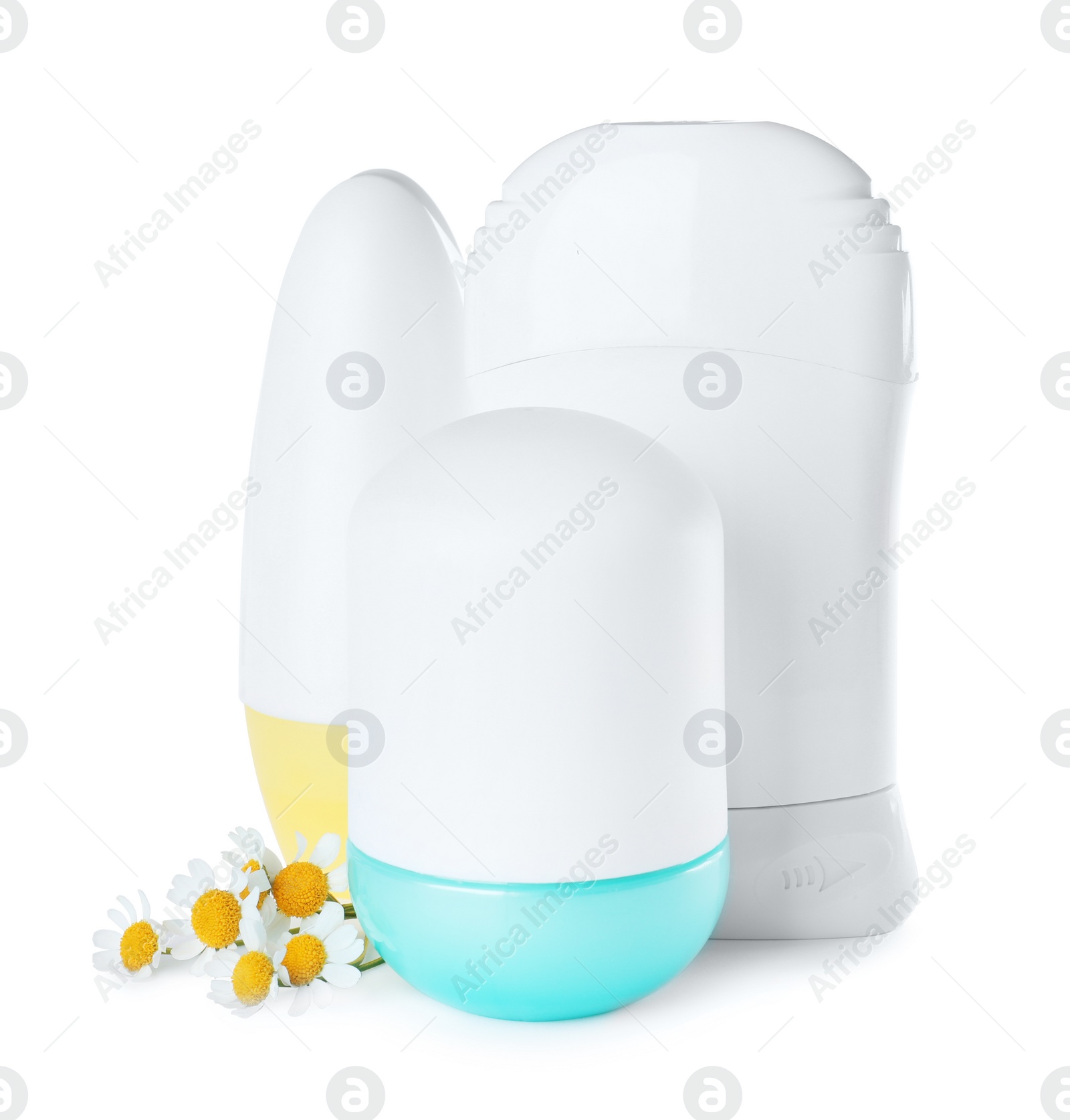 Photo of Different natural female deodorants with chamomile flowers on white background. Skin care