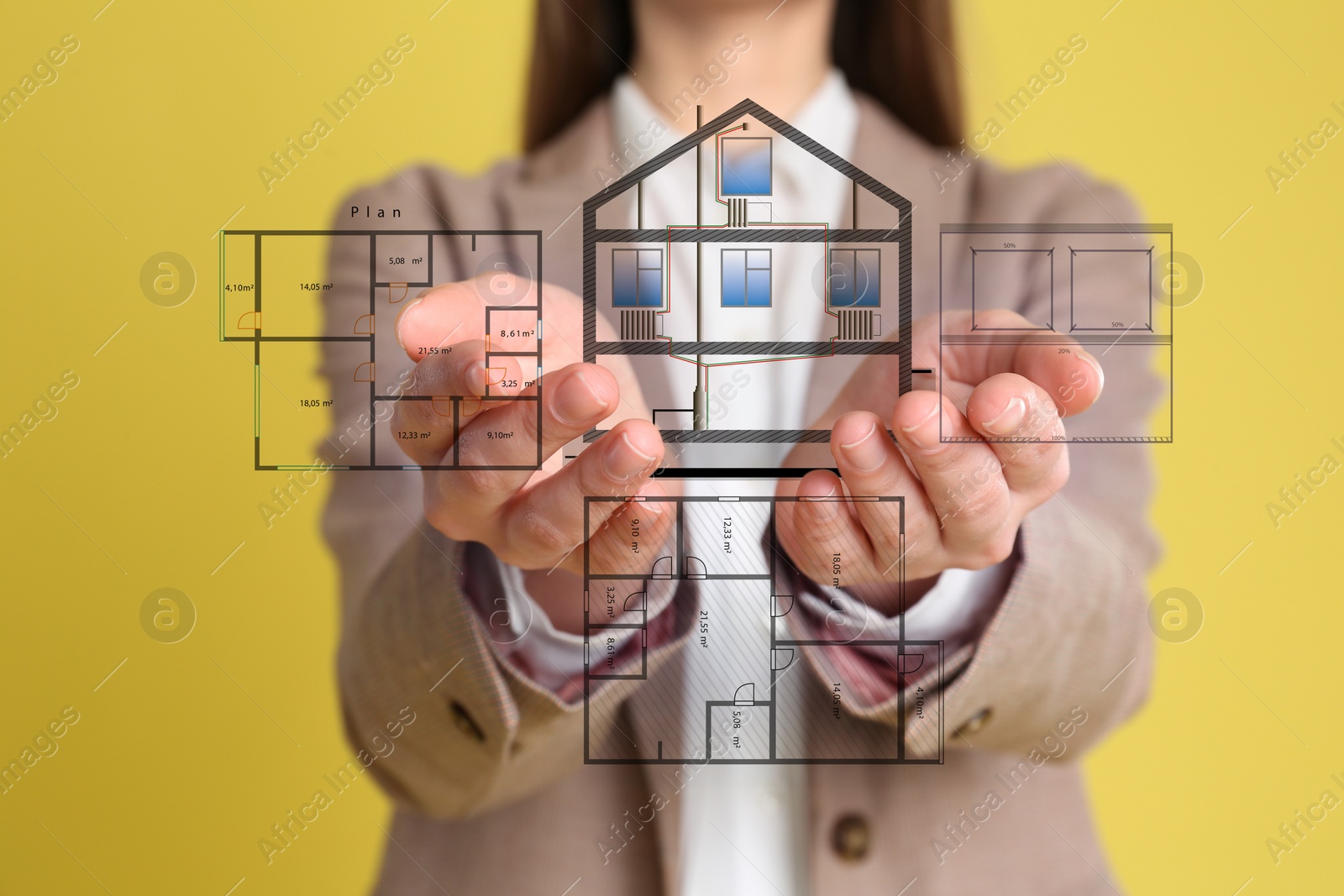 Image of Designer presenting project of house with planning and heating system on yellow background