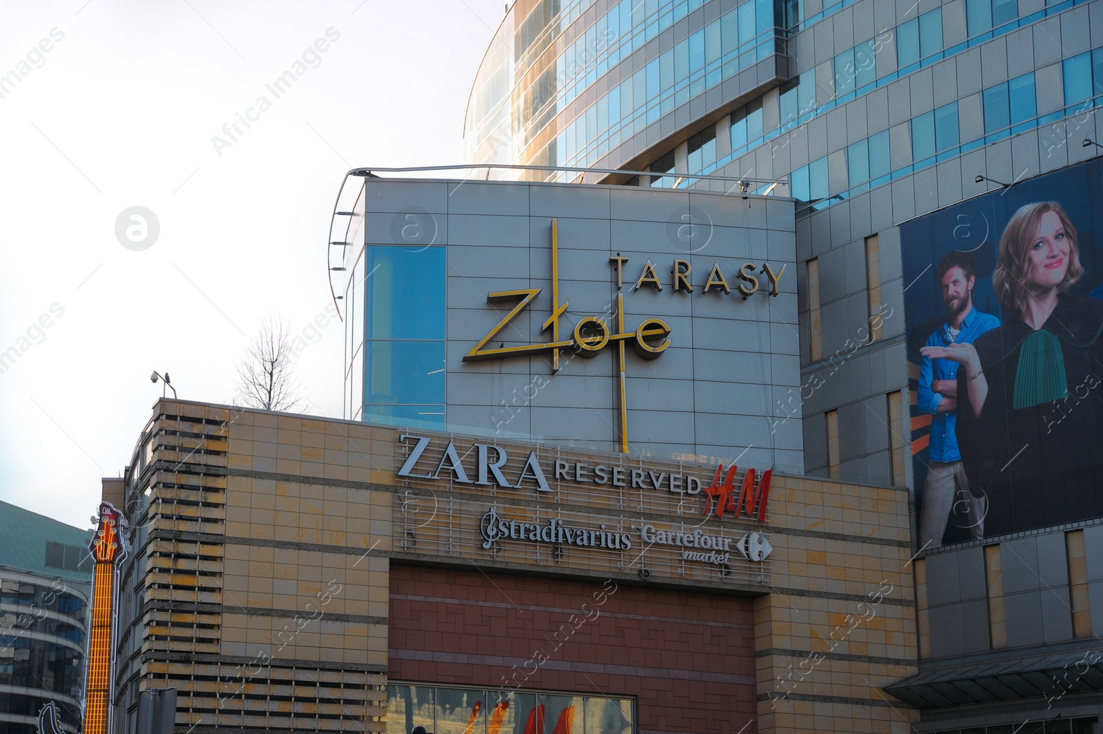 Photo of WARSAW, POLAND - MARCH 22, 2022: Shopping mall Golden Terraces on city street