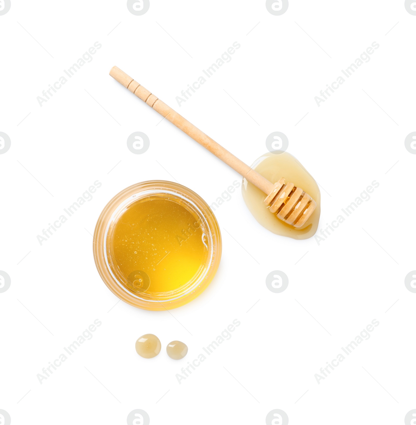 Photo of Tasty honey in glass jar and dipper isolated on white, top view