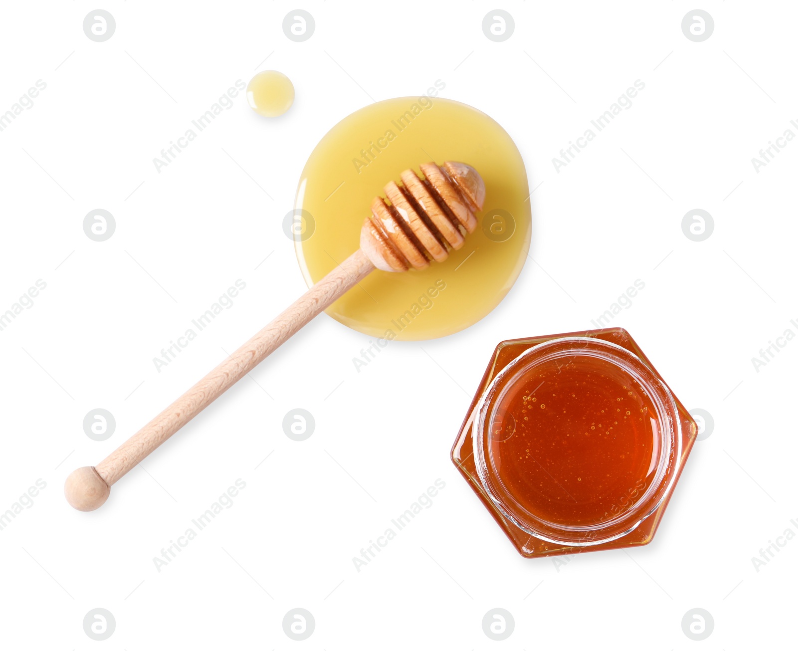 Photo of Tasty natural honey, glass jar and dipper on white background, top view