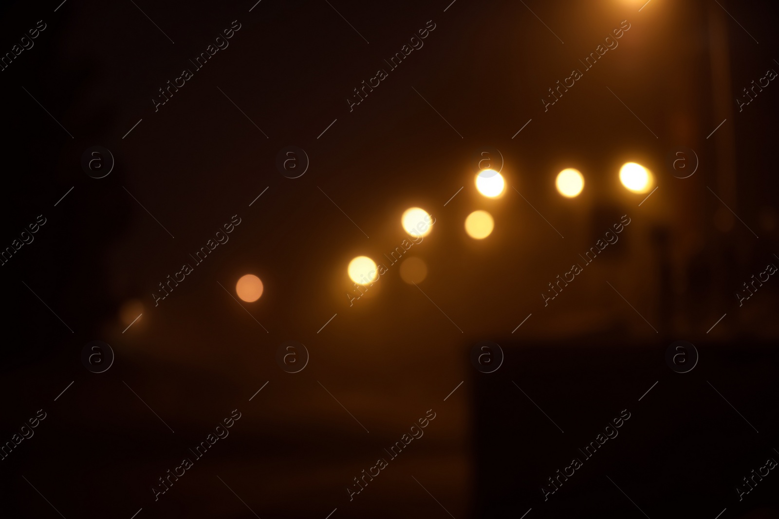 Photo of Blurred view of night city. Bokeh effect