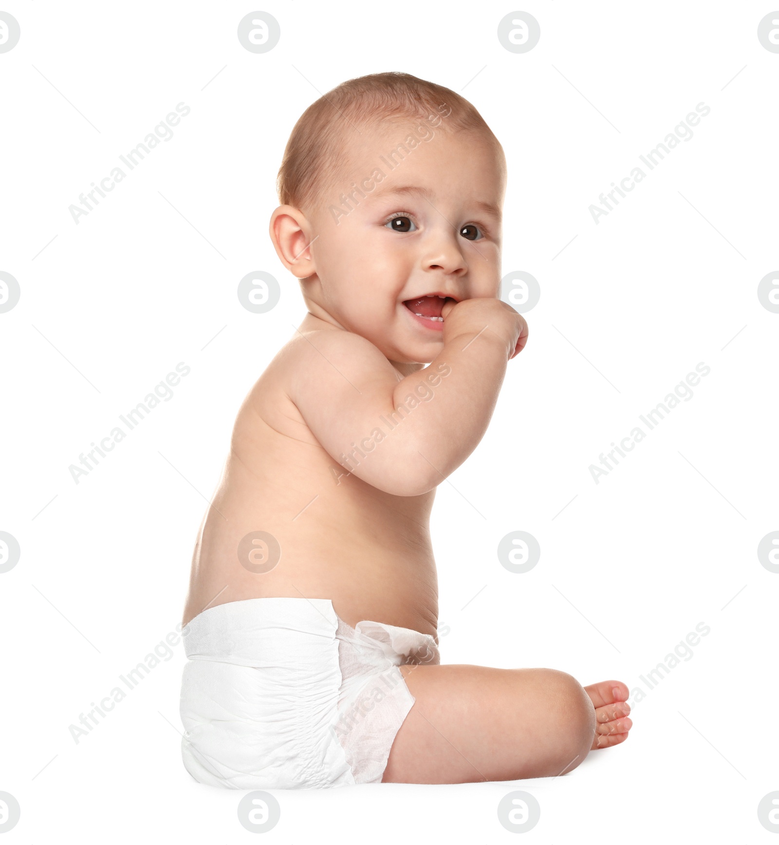 Photo of Cute little baby sitting on white background