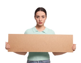 Photo of Young woman holding blank cardboard banner on white background, space for text