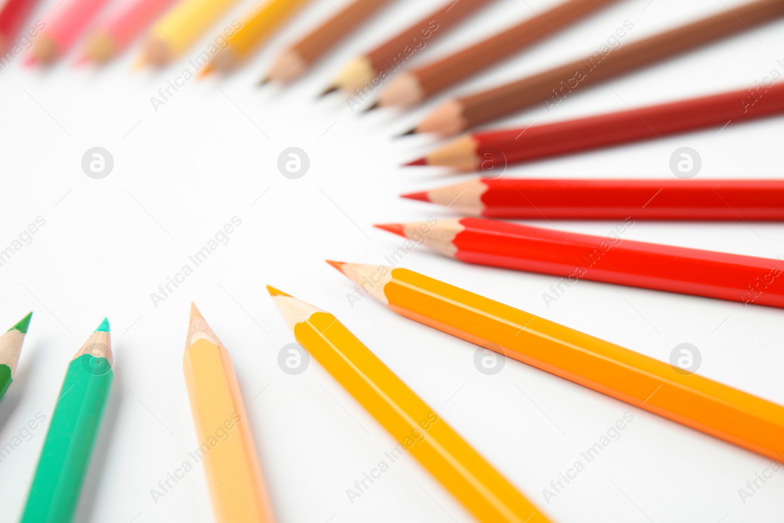 Photo of Composition with color pencils on white background