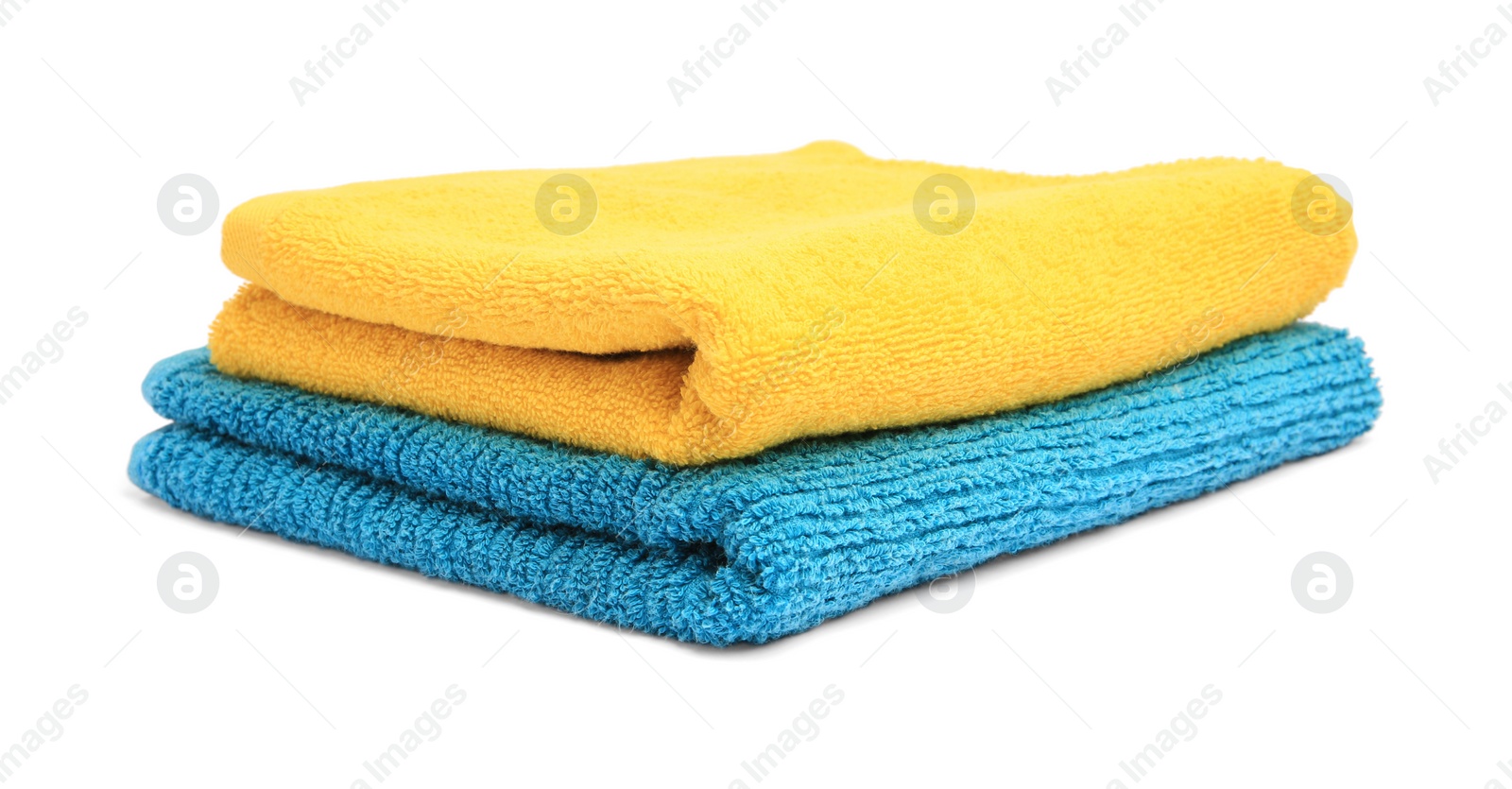 Photo of Two colorful terry towels isolated on white