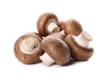 Fresh champignon mushrooms isolated on white. Healthy food