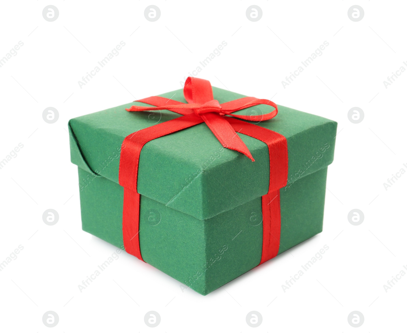 Photo of Green gift box with red bow isolated on white