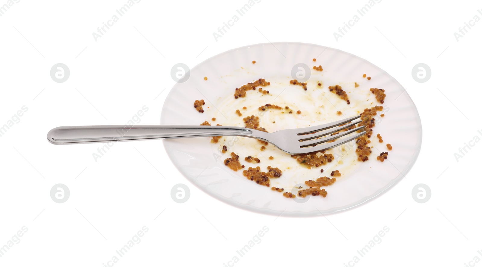 Photo of Dirty plate and fork on white background